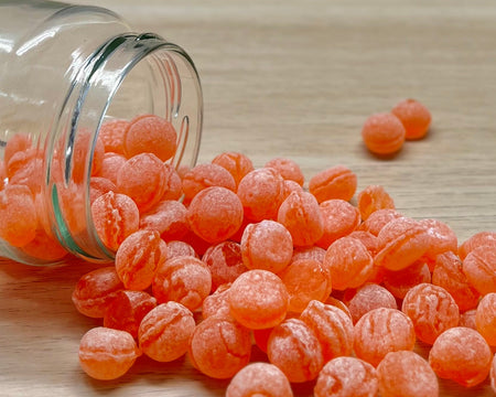 Bonbons durs artisanaux des Vosges à La Bresse - Pêche - Délicieuses friandises fabriquées à la main avec des ingrédients locaux de qualité supérieure